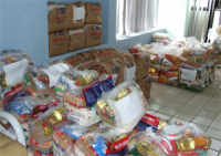 Parte dos alimentos arrecadados pela JT , que estão sendo entregues a sete entidades filantrópicas