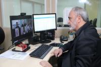 Foto mostra o juiz Paulo Mont'Alverne coordenador do CEJUSC em audiência telepresencial durante a 9ª Semana Nacional de Concialiação
