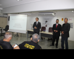 Juiz Bruno e os agentes de segurança Luciano e Bruno na abertura do evento