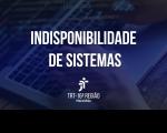 Arte com fundo azul escuro transparente sobre foto de um teclado de notebook. Em primeiro plano, texto branco centralizado INDISPONIBILIDADE DE SISTTEMAS.  Na base, a logomarca do TRT-16 também centralizada.