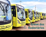 Foto mostra ônibus amarelos enfileirados lado a lado. Em primeiro plano, à direita, lê-se o texto GREVE DOS RODOVIÁRIOS em letras azuis. À esquerda deste, a logomarca do TRT-16.